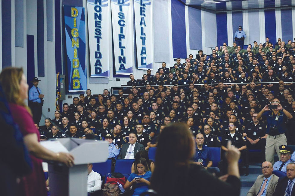 At Criminal Justice University College theater in Gurabo, the governor signed House Bill 406, which creates the Puerto Rico Police as a separate entity from the DSP.