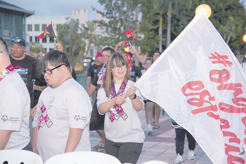 Grupo de atletas de Special Olympics Puerto Rico desfiló haciendo entrada a la Plaza Santiago R. Palmer.