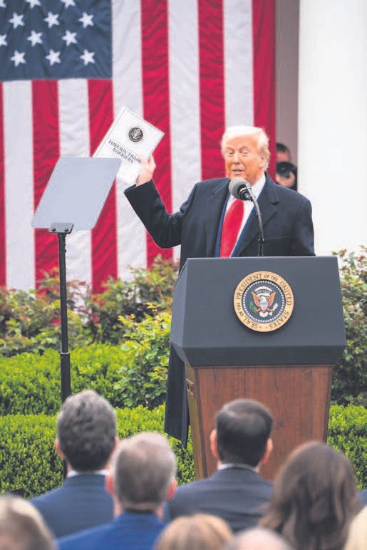 President Donald Trump announces new tariffs at the White House in Washington, April 2, 2025. The president has earned a reputation for bluffing on tariffs. But he has steadily and dramatically raised U.S. tariffs, transforming global trade. (Haiyun Jiang/The New York Times)