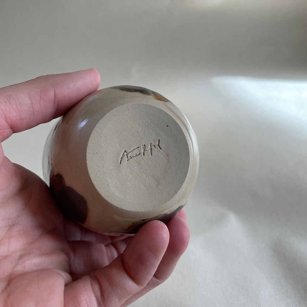 Miniatyrbilde: Kopp med brunt mønster