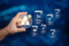 A hand selecting a profile icon with various business and communication app icons in the b