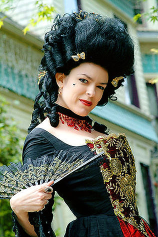 Enchanted Custom Corsets' owner, Lisa Marie, in custom Victorian ensemble