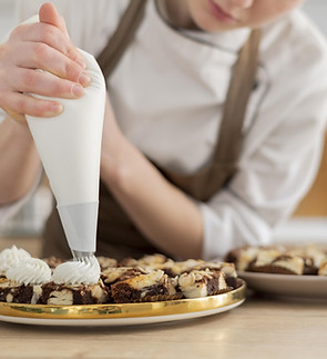 close-up-cook-preparing-dessert.jpg