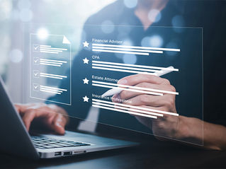 Client going through his checklist of professionals that make up his financial team