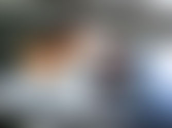 Family looking at looking at a car and deciding on whether to buy or lease.