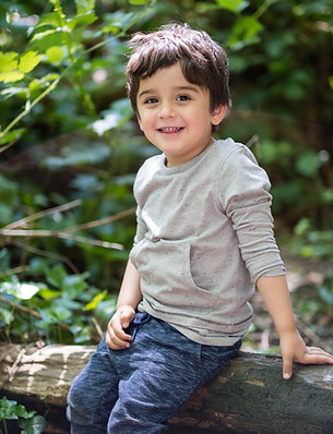 Portrait photograph of child at Little Wild Forest School, UK