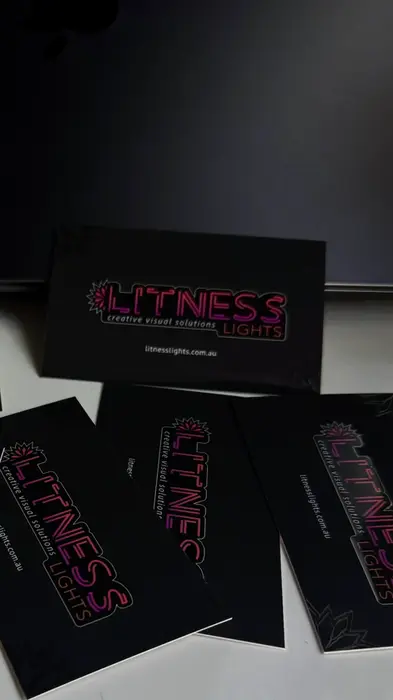 Litness Lights business cards designed by Create Discussion, showcasing UV Spot detailing that reflects the brand's unique approach to innovative  lighting design.