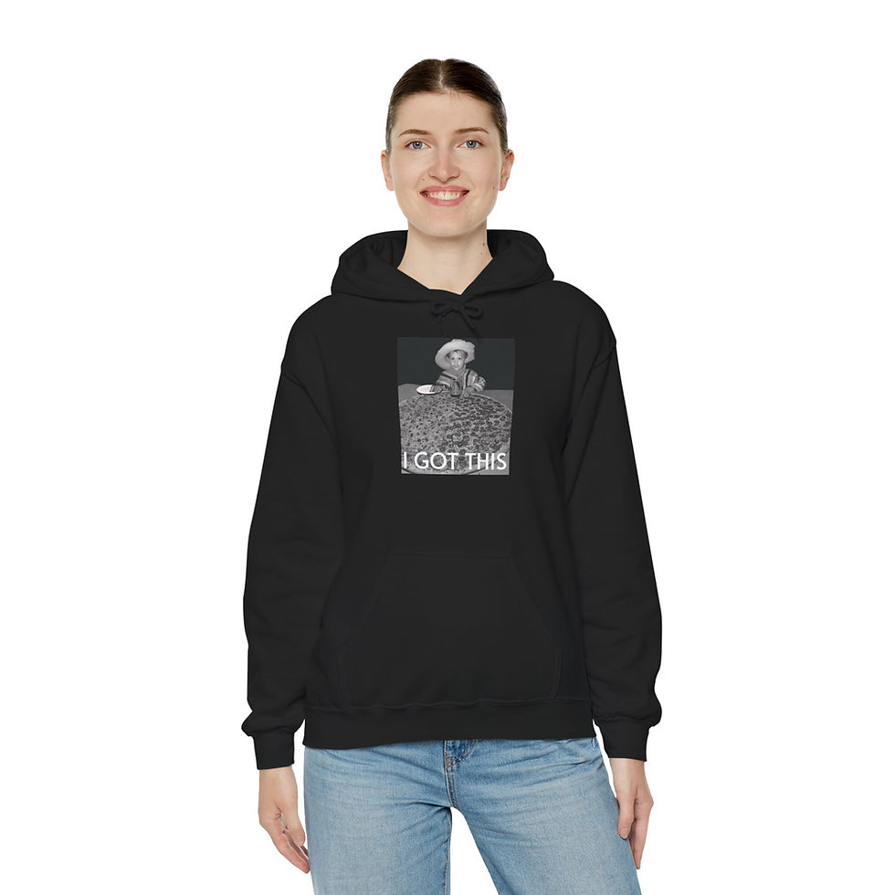 A cozy hoodie featuring a black and white photo of a little boy, dressed in costume, with a sombrero, and seated behind a giant pizza. At the bottom of the photo is the text, "I got this."