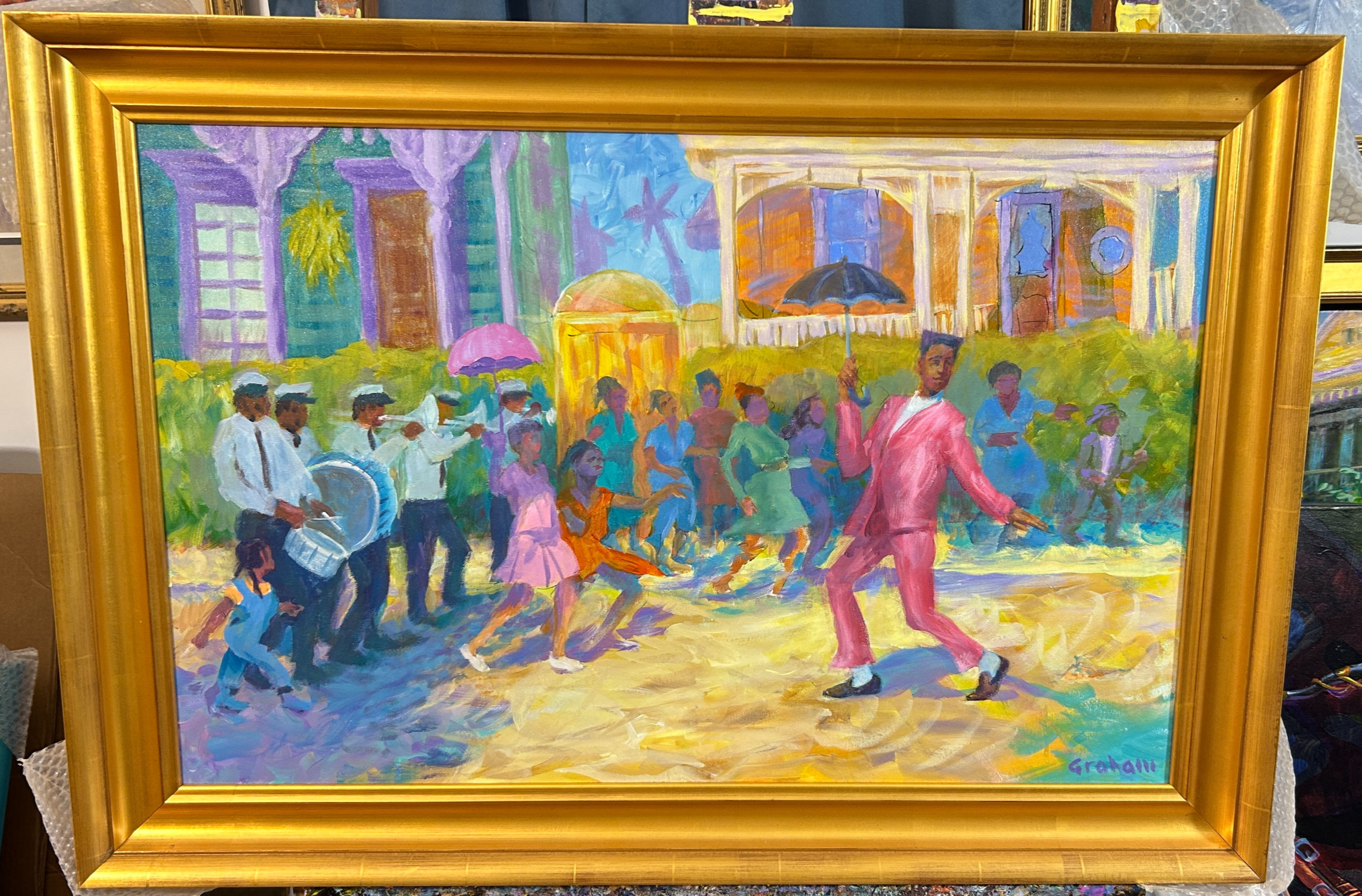 Pink suit on Jon Batiste in New Orleans