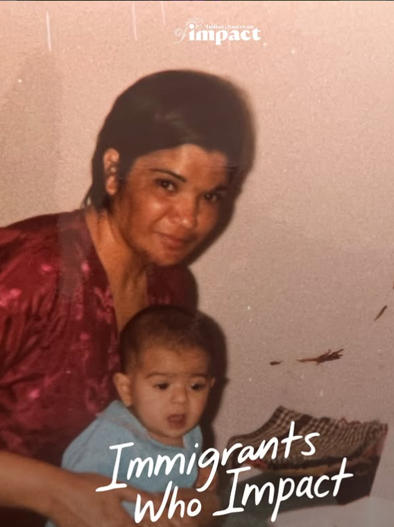Pakistani woman in red shirt smiles at the camera, holding infant son Rehan Mahmood, who is wearing a blue onesie. Text above reads "Indian American Impact."