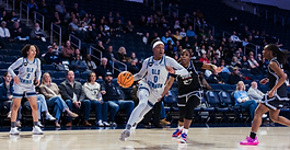 Jaylen Ponder drives baseline against Georgia State Panthers.