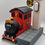 Thumbnail: Hogwarts piggy bank train with platform