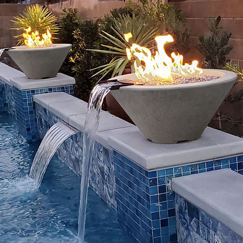 Custom pool with fire bowl and water feature build by Trinity Pools in Citrus County Florida