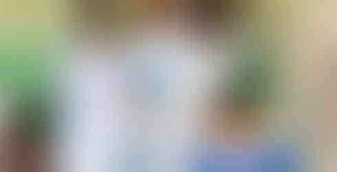 Sule and Lydia testing water at a TAP Partner School