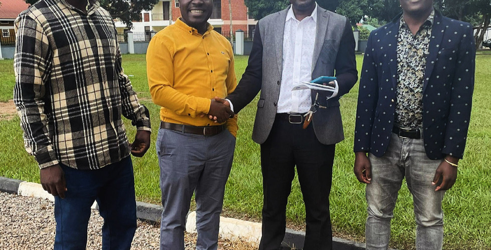 TAP Team smiling and shaking hands