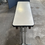 Miniature : Petite table bois blanc 120x40 avec pied rabatables (Qté :15) TAB210