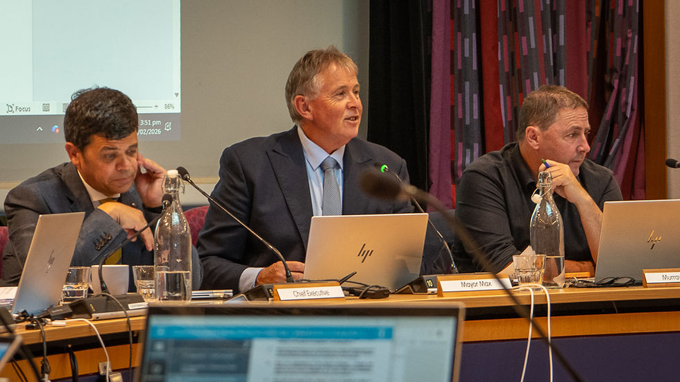 A cheery 'Mayor Max' thanked the room, flanked by the outgoing chief executive Gareth Green and deputy mayor Murray Chong in black shirt. (Te Korimako o Taranaki)