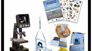 Moanamana kit with microscope, sample gear, guidebooklets, and marine tools on white background, labeled MM2.