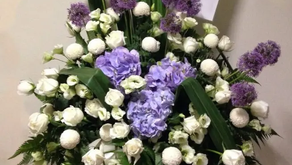 Why Do Florists Recommend White Flowers for Condolences Flower Delivery Singapore