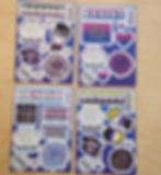 Image of ace, bisexual, trans, and nonbinary sticker sheets in a 2x2 square.
