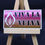 Thumbnail: 3" sticker with pink to brown skintone ombre, illustration of a vulva and text "Viva La Vulva" in black.