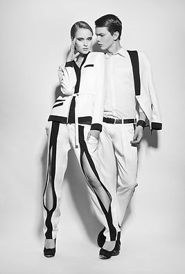 Models in black and white suits