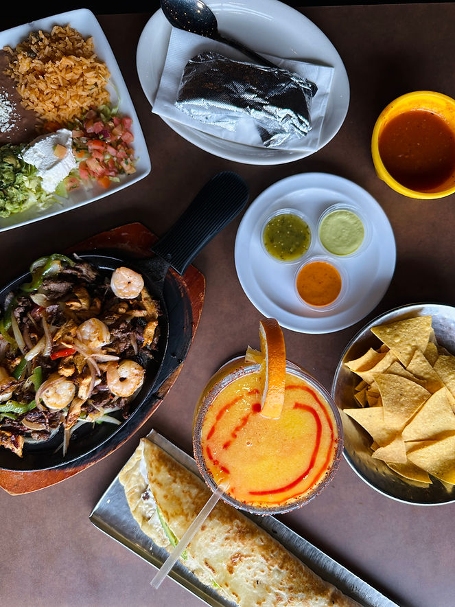 This is an image of various dishes sold at Machete Cocina Mexicana.