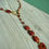 Thumbnail: Golden Sandstone Sleek Lariat Necklace with Carved Gold Sandstone Heart Pendant