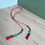 Thumbnail: Pink and Turquoise Faux-Suede Bolo Necklace