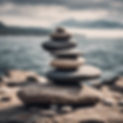 meditation rocks pilled on top of each other in a serene setting .jpg