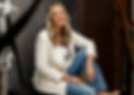 Amy Ester seated on the set of Avy Productions studio during her Anchored in Health branding session