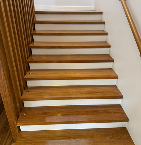 Sand and polish of staircase, entire ground floor and top floor hallway. Featuring Loba WS Easy Prime and Loba WS Easy Finish.