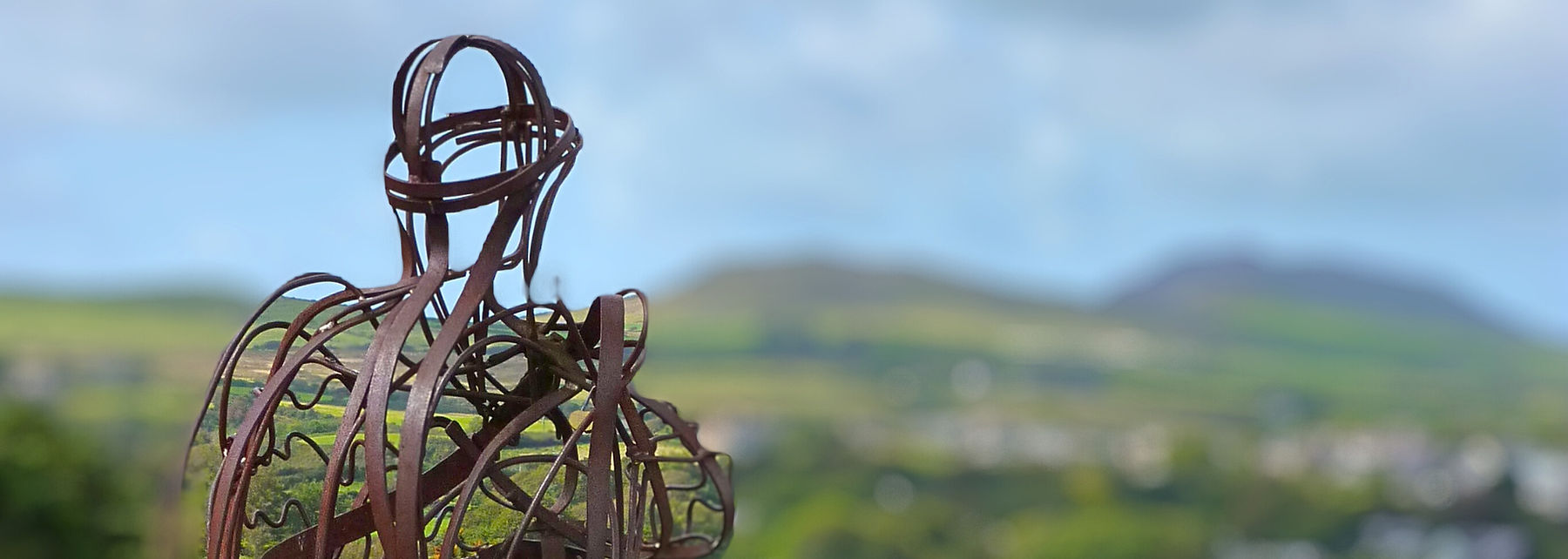 The Tin Man statue at Llanbedrog beach | luxury glamping | shephrd hut | North Wales