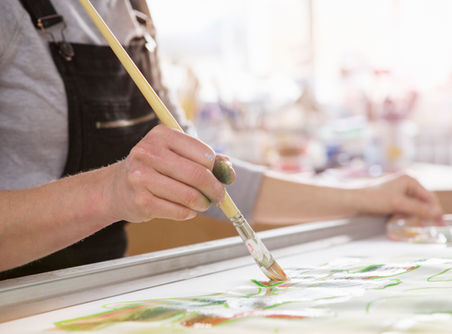 painter holding brush