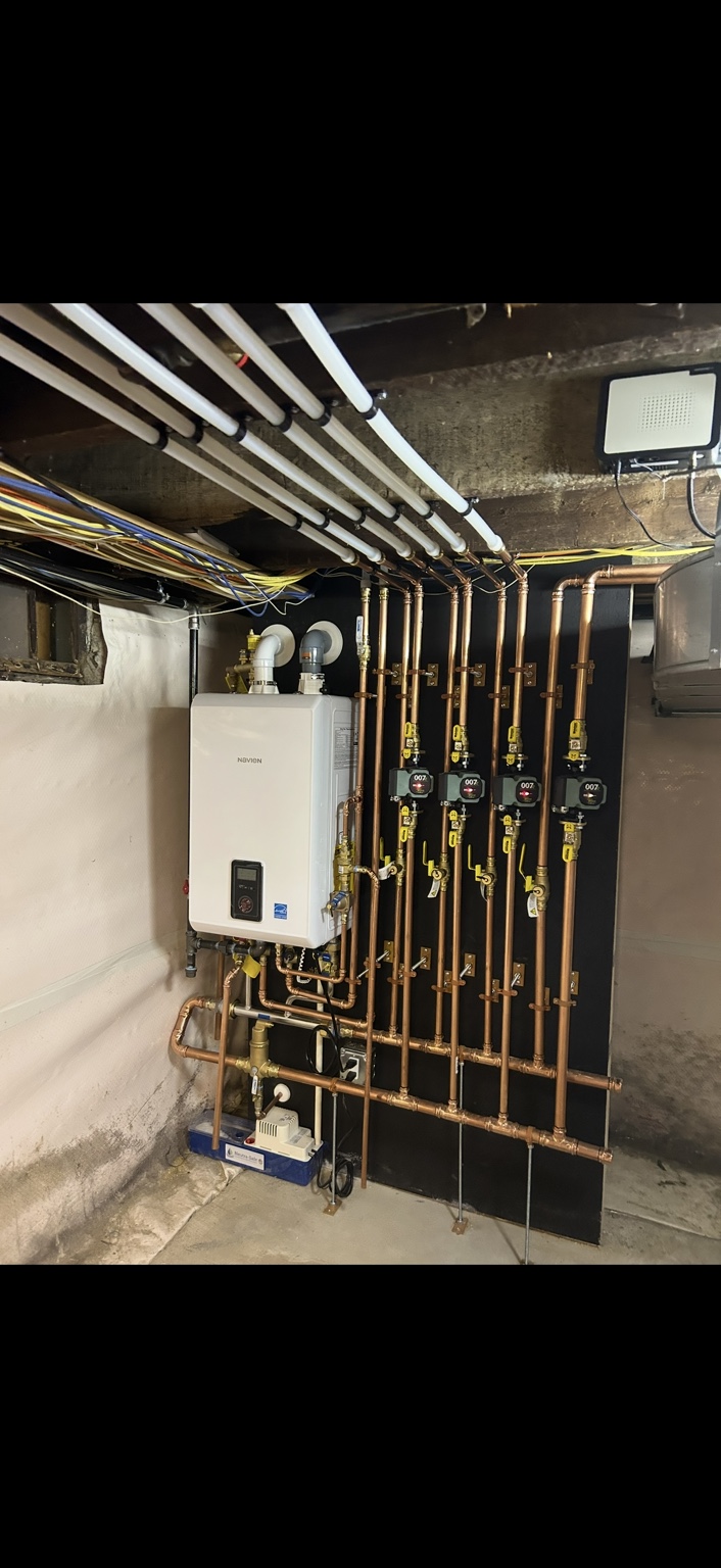 Completed Boyle Navien boiler replacement with copper piping and heating circulators