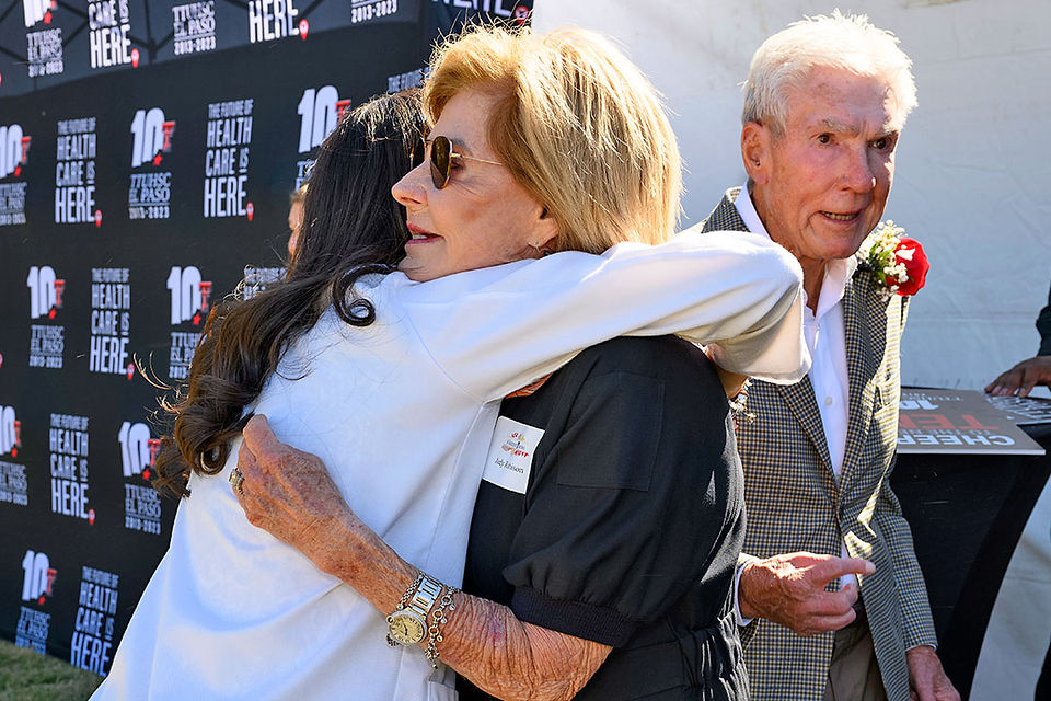 Judy Robison embraces scholarship recipient Diana Moreno.