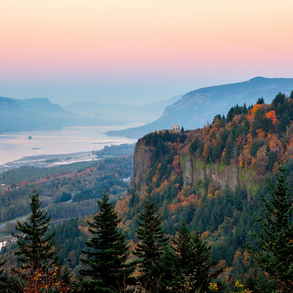 fall colors among the towering cliffs and river front of Oregon's Columbia River Gorge