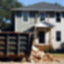 exterior home renovation with dumpster in front.jpg