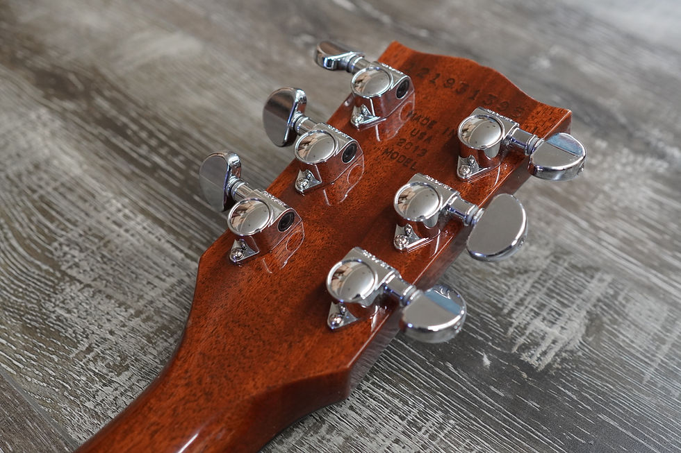 Thumbnail: Back of the headstock with chrome tuning pegs on Gibson Les Paul