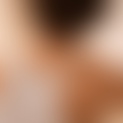 Person in a white tank top rubbing their neck in a softly lit room, conveying discomfort. Warm tones in the background add a calm mood.