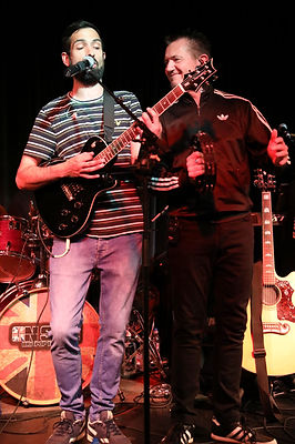 A photo of us, Onside Britpop, a Britpop Tribute Band, performing live recently.