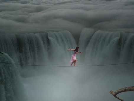 Scale of Consciousness chart showing emotional frequencies