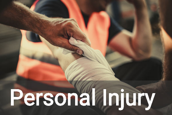 Injured arm being bandaged, text Personal Injury