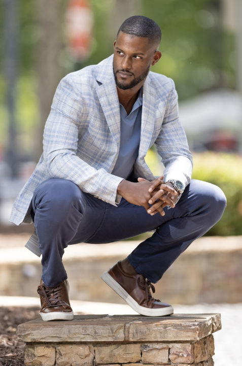 Man wearing a relaxed-fit, fashionable suit