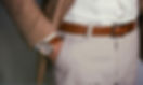 Close-up view of a man highlighting his shirt and trousers