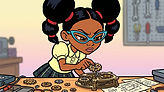 Girl with pigtails intently assembling gears