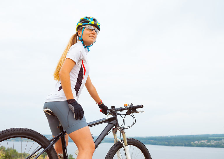 young-girl-riding-bicycle-outside (2).jp