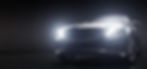 Luxurious cars, limousines in garage with lights turned on.