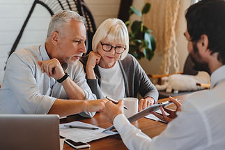 senior couple consulting a tax expert