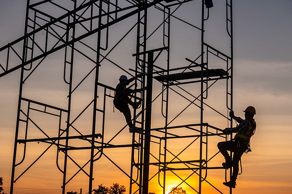 construction workers on scaffolding